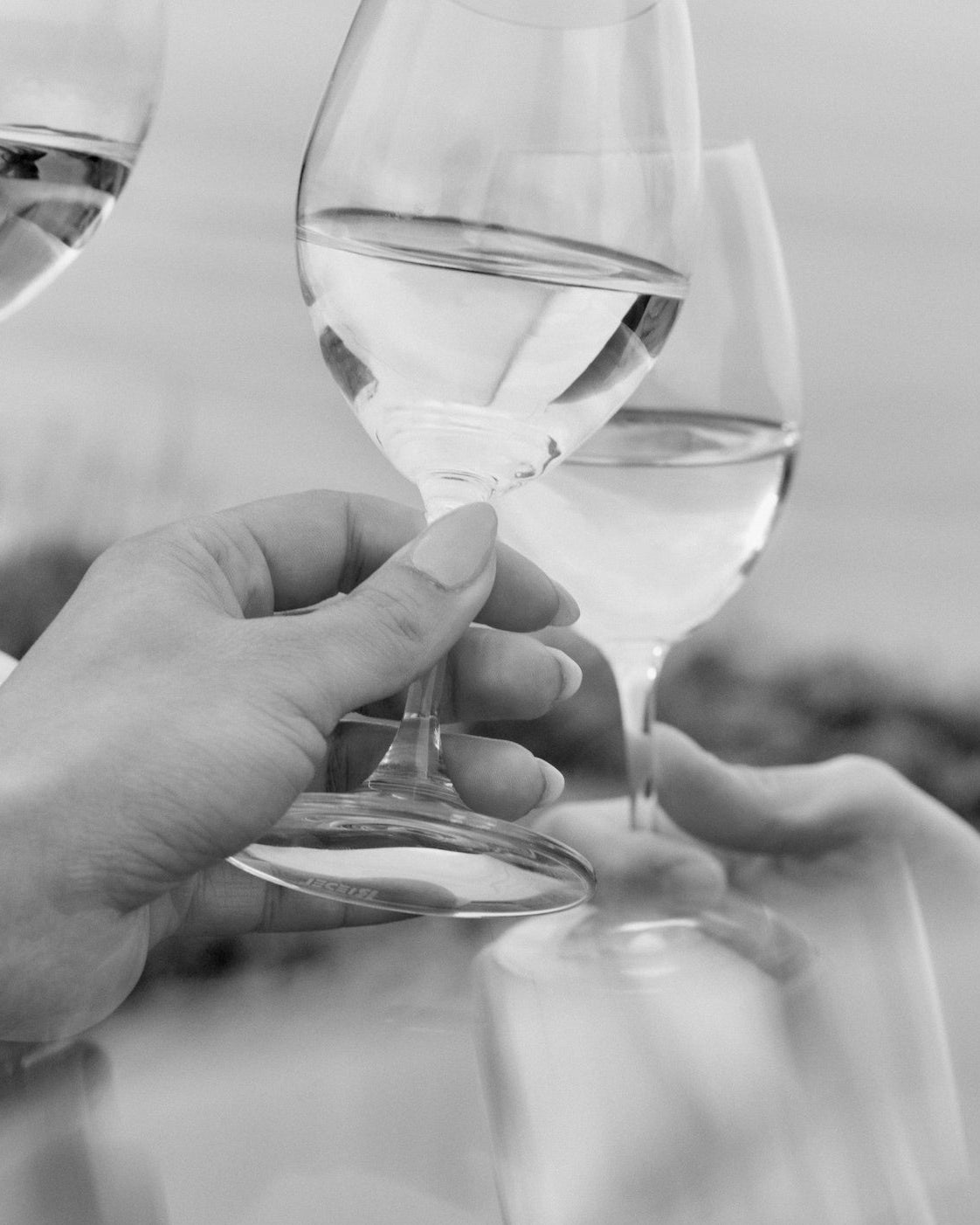 Friends share Xanadu Chardonnay by Margaret River beach