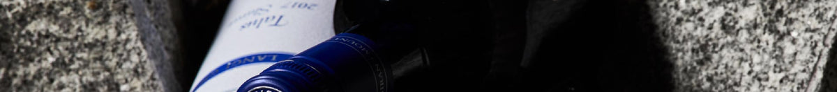 Bottle of Mount Langi Ghiran Talus Shiraz nestled between rocks
